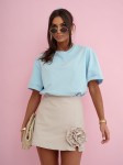  Mili bawełniany t-shirt oversize z gumką w kolorze błękitnym