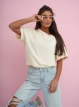 Mili bawełniany t-shirt oversize z gumką w kolorze waniliowym
